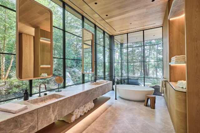 Claybrook’s Ellipse bath, featured in this Muskoka residence, offers a sculptural sanctuary for slow mornings and long soaks, framed by expansive views through floor-to-ceiling windows.

Designed by OPUS 356, this luxury home is surrounded by warm wood and intricate stone, creating a seamless connection to nature. The Ellipse bath is a natural complement to the bath, bringing a sense of luxury to this serene lakeside setting.

#claybrook #ellipsebath  #muskokadesign #luxurydesign @claybrookinteriors